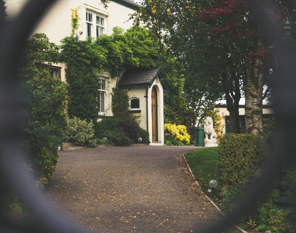 front porch viewed through a gate